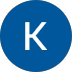 The letter k is in a blue circle on a white background.